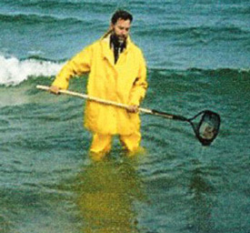 man collecting Baltic amber in the Baltic sea